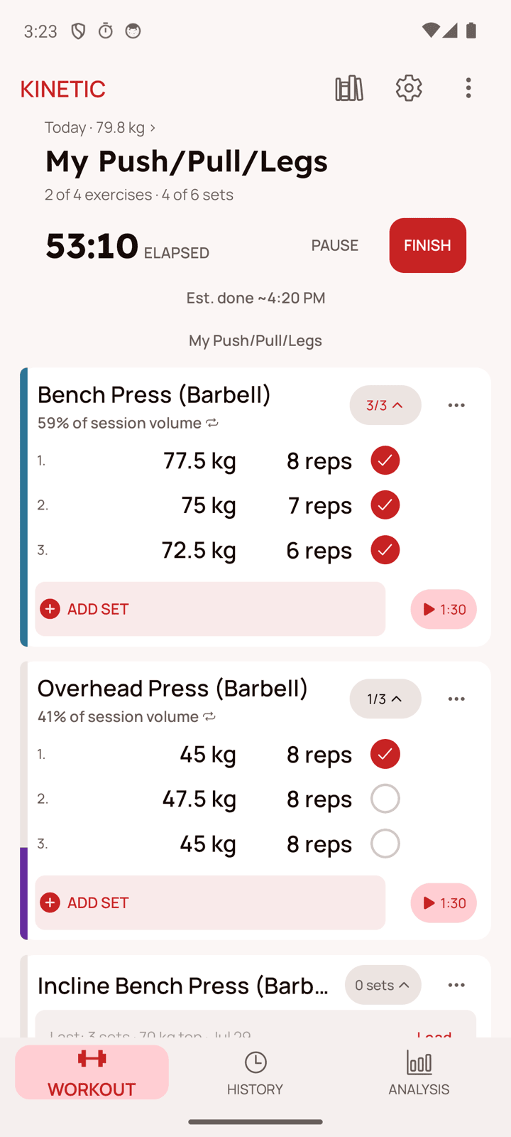 Kinetic workout screen showing a mid-session workout with the day pager visible at top